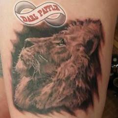 Realistic lion tattoo. Gentle lion tattoo. Beautiful lion tattoo.